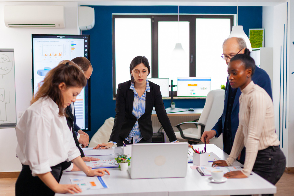 How should you prepare for a business conference before you arrive